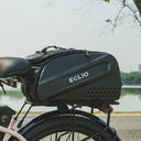 Eclio Black bicycle saddle bag attached to a bike, outdoors.